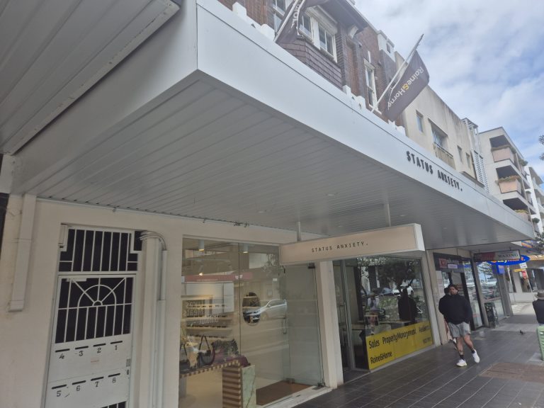 Shop front awning with new white soffit on Hall Street, Bondi Beach