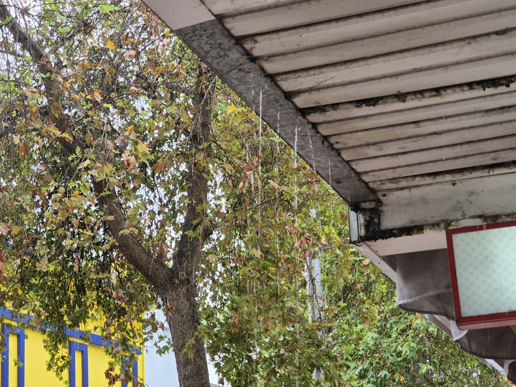 Leaking shop awning with stained soffit on a Chatswood shopfront